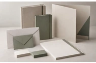 Cadernos, envelopes e papéis de carta